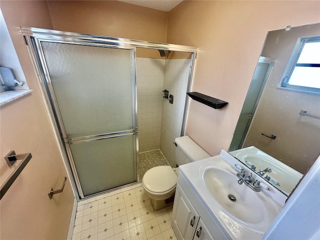 13102 Pembrook Ct, Hudson, FL 34667 - bathroom featuring a shower stall, vanity, and tile patterned floors