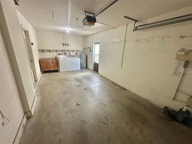 13102 Pembrook Ct, Hudson, FL 34667 - garage featuring separate washer and dryer, a garage door opener, and electric water heater