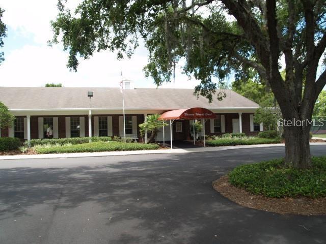 13102 Pembrook Ct, Hudson, FL 34667 - view of front facade with driveway