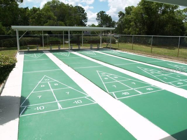 13102 Pembrook Ct, Hudson, FL 34667 - view of property's community with shuffleboard
