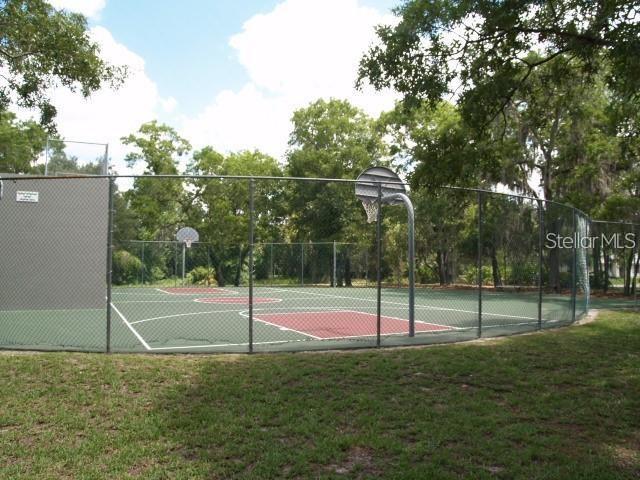 13102 Pembrook Ct, Hudson, FL 34667 - view of sport court featuring community basketball court
