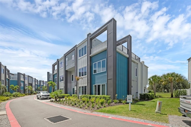 7740 Sandy Ridge Dr Unit 235, Reunion, FL 34747 - view of property with a residential view