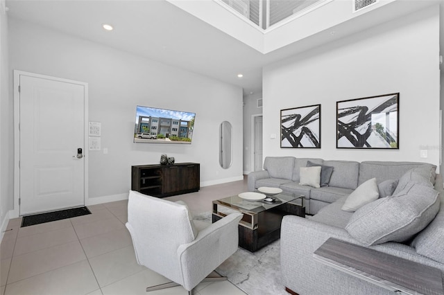 7740 Sandy Ridge Dr Unit 235, Reunion, FL 34747 - living area featuring a high ceiling, light tile patterned floors, and recessed lighting