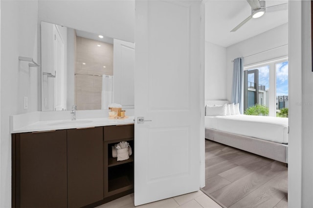 7740 Sandy Ridge Dr Unit 235, Reunion, FL 34747 - ensuite bathroom with vanity, ceiling fan, recessed lighting, and a shower