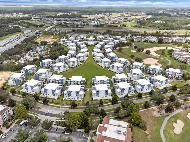 7740 Sandy Ridge Dr Unit 235, Reunion, FL 34747 - aerial view of property and surrounding area with a local golf course and nearby suburban area