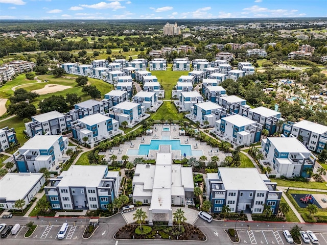7740 Sandy Ridge Dr Unit 235, Reunion, FL 34747 - bird's eye view of a pool and a local golf course