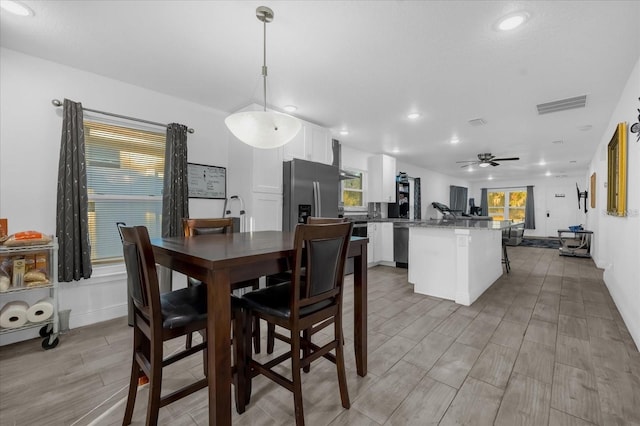 1208 Old Apopka Rd, Apopka, FL 32703 - dining space featuring a ceiling fan, light wood finished floors, and recessed lighting