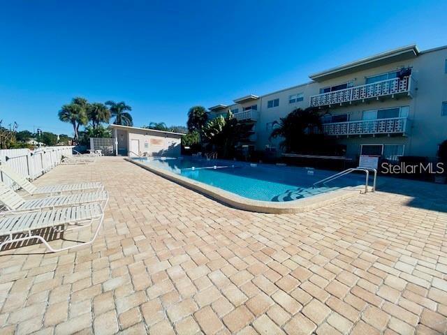 221 Columbia Dr Unit 342, Cape Canaveral, FL 32920 - community pool featuring a patio