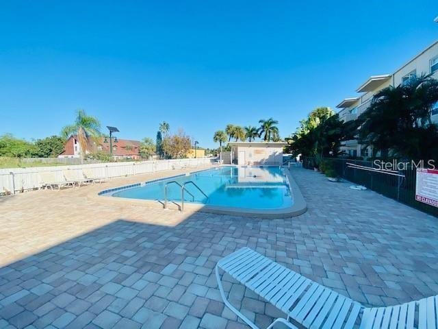 221 Columbia Dr Unit 342, Cape Canaveral, FL 32920 - community pool featuring a patio