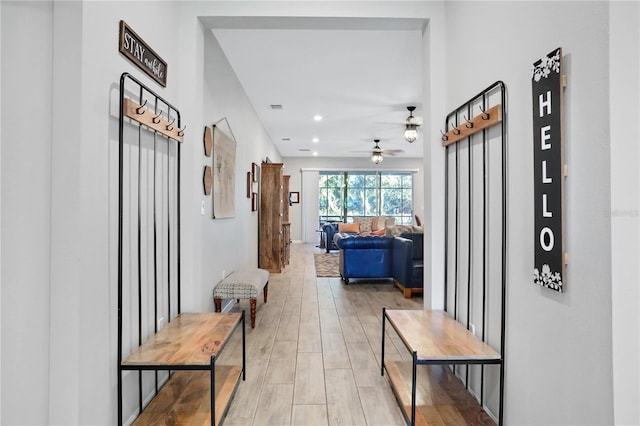2541 Shanti Dr, Kissimmee, FL 34746 - hallway featuring light wood-type flooring and recessed lighting