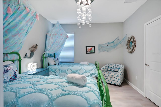 2541 Shanti Dr, Kissimmee, FL 34746 - bedroom with wood finished floors and baseboards