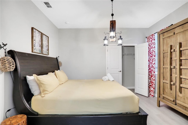 2541 Shanti Dr, Kissimmee, FL 34746 - bedroom with light wood finished floors and a closet