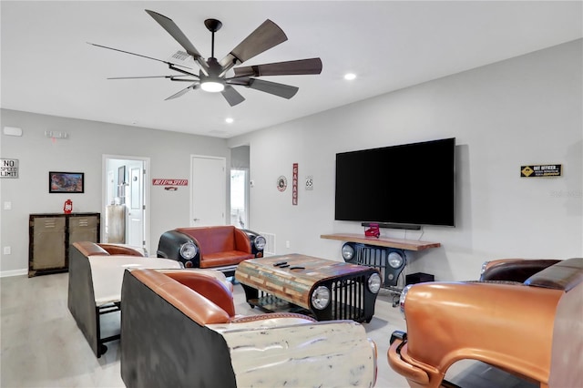 2541 Shanti Dr, Kissimmee, FL 34746 - living area featuring a ceiling fan, recessed lighting, and wood finished floors
