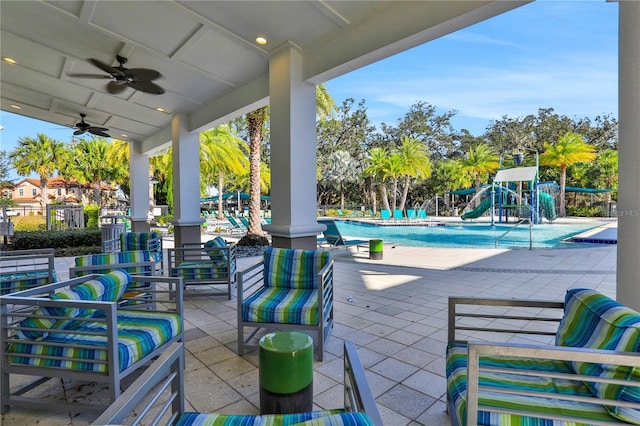 2541 Shanti Dr, Kissimmee, FL 34746 - view of patio / terrace featuring a community pool and a ceiling fan