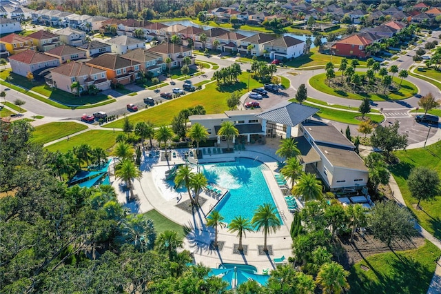 2541 Shanti Dr, Kissimmee, FL 34746 - aerial perspective of suburban area featuring a pool area