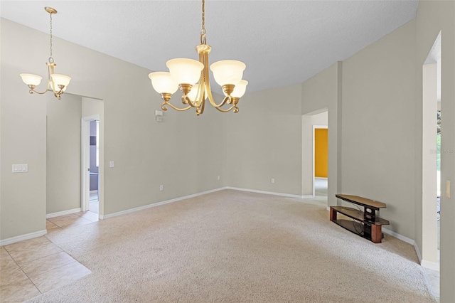 123 Preston Ave, Davenport, FL 33837 - spare room with a chandelier and light colored carpet