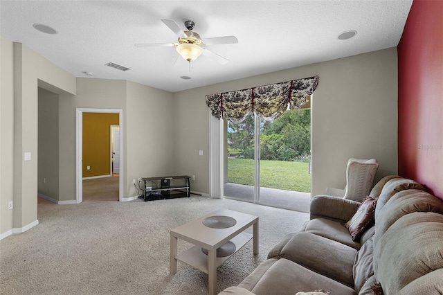 123 Preston Ave, Davenport, FL 33837 - living area with ceiling fan and light colored carpet