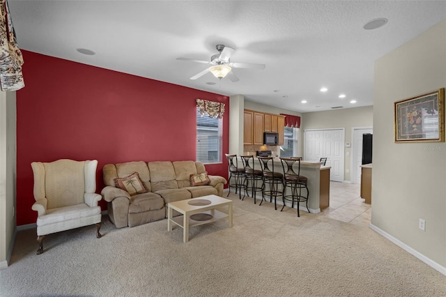 123 Preston Ave, Davenport, FL 33837 - living area featuring light colored carpet, ceiling fan, and recessed lighting