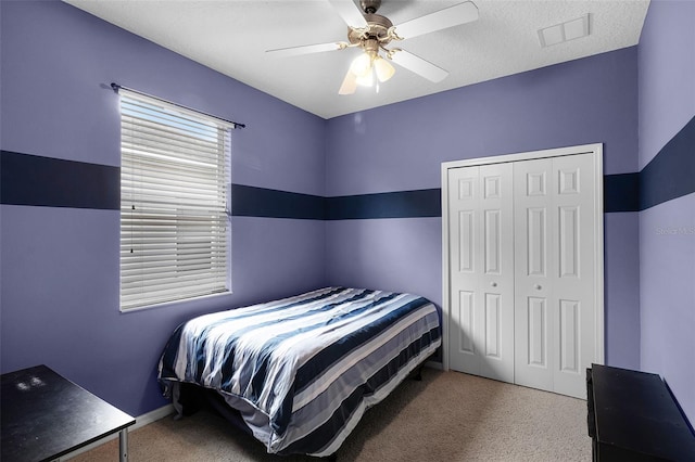 123 Preston Ave, Davenport, FL 33837 - carpeted bedroom with a closet and ceiling fan