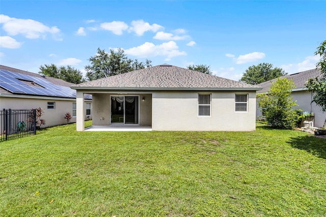 123 Preston Ave, Davenport, FL 33837 - rear view of house featuring a patio area, stucco siding, and roof with shingles