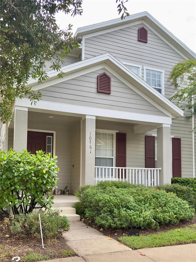 10238 Cala Lily Trl Unit S, Orlando, FL 32832 - view of front of house with covered porch