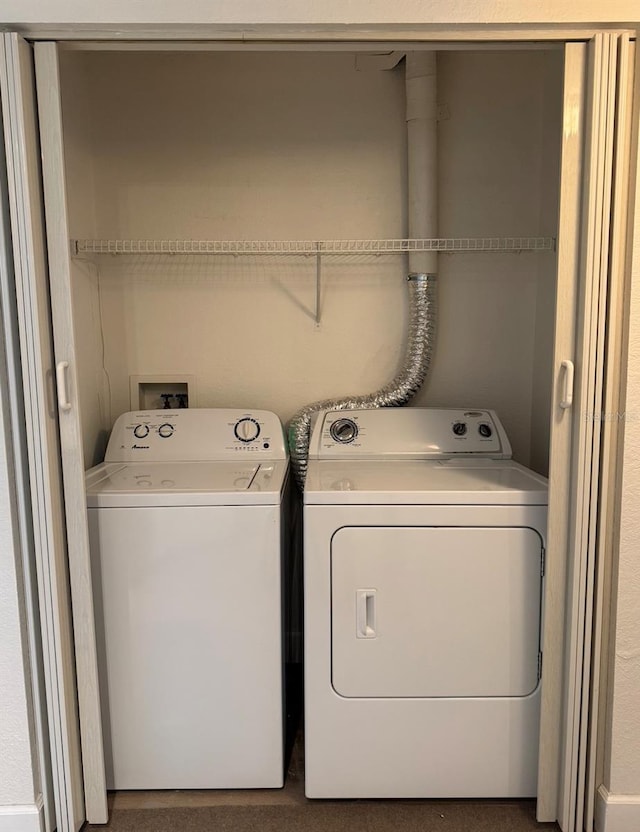 7280 Westpointe Blvd Unit 823, Orlando, FL 32835 - washroom with washer and clothes dryer