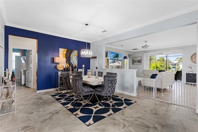 2215 Camden Park Ave, Davenport, FL 33837 - dining room with a chandelier, marble finish floors, and ornamental molding