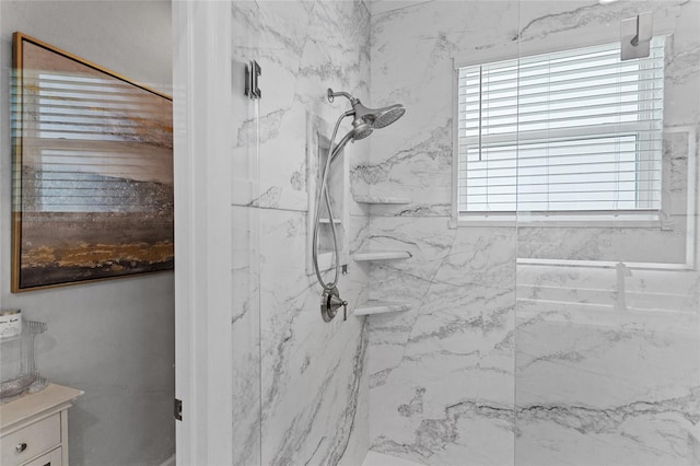 2215 Camden Park Ave, Davenport, FL 33837 - bathroom featuring a marble finish shower and vanity