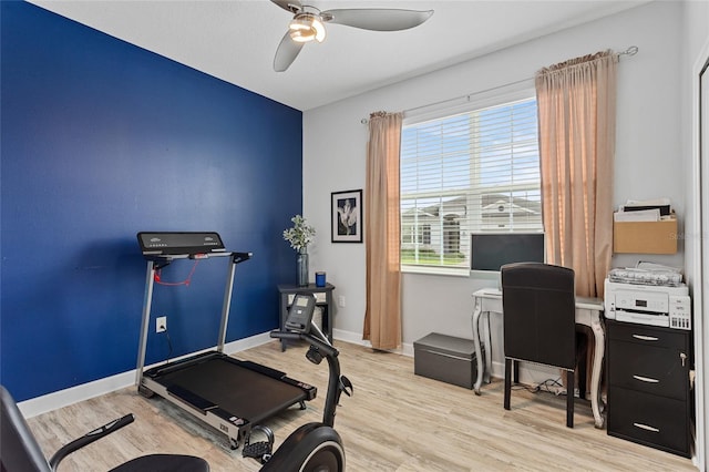 2215 Camden Park Ave, Davenport, FL 33837 - exercise room featuring a ceiling fan and light wood-type flooring
