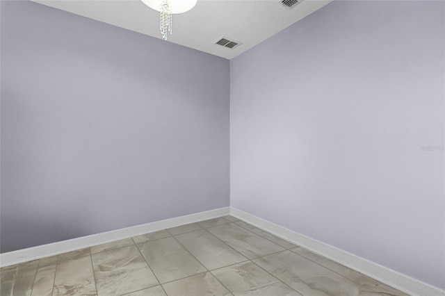 2215 Camden Park Ave, Davenport, FL 33837 - empty room featuring light marble finish floors