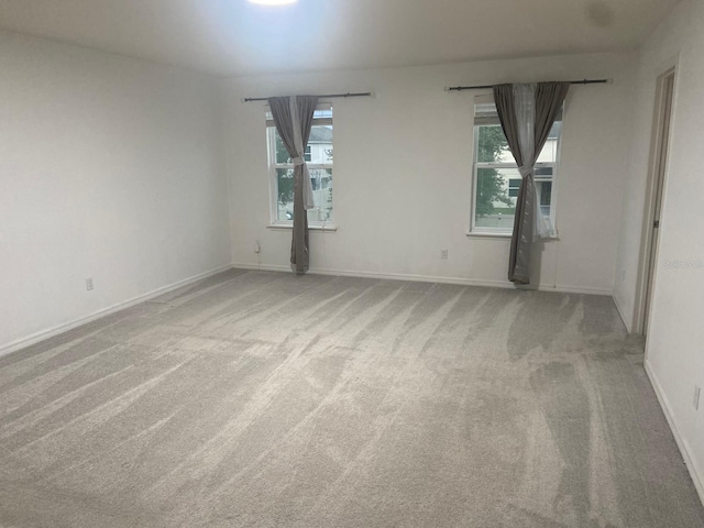 2618 San Simeon Way, Kissimmee, FL 34741 - carpeted spare room featuring plenty of natural light