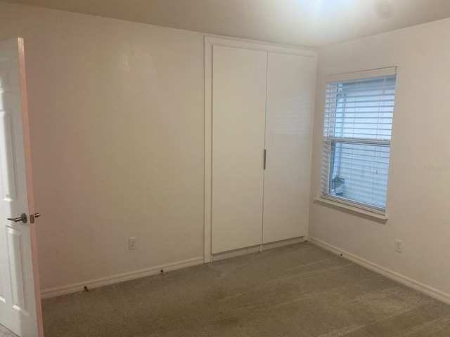 2618 San Simeon Way, Kissimmee, FL 34741 - unfurnished bedroom with carpet and a closet