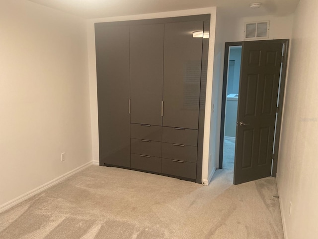 2618 San Simeon Way, Kissimmee, FL 34741 - unfurnished bedroom with light colored carpet and baseboards