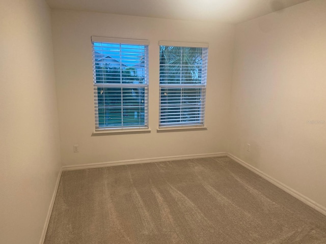 2618 San Simeon Way, Kissimmee, FL 34741 - empty room featuring carpet flooring and baseboards