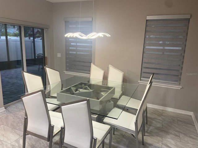2618 San Simeon Way, Kissimmee, FL 34741 - dining space with light marble finish flooring and baseboards