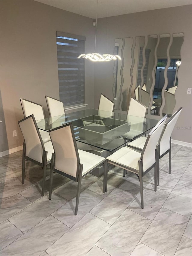 2618 San Simeon Way, Kissimmee, FL 34741 - dining room featuring baseboards