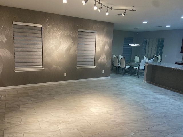 2618 San Simeon Way, Kissimmee, FL 34741 - unfurnished living room with marble look tile flooring and recessed lighting
