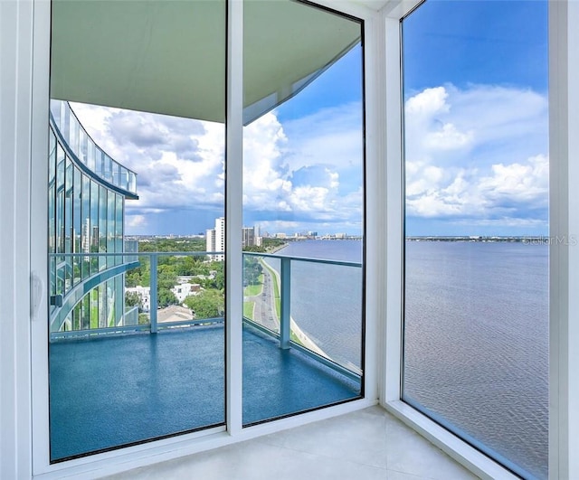 balcony featuring a water view