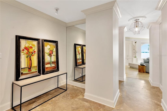 hall featuring an inviting chandelier, light tile floors, and ornamental molding