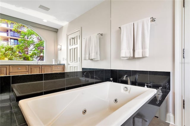 bathroom featuring tile floors and vanity