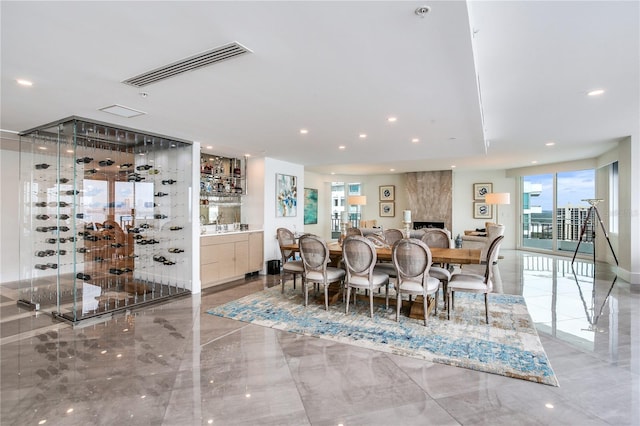 dining area with a premium fireplace