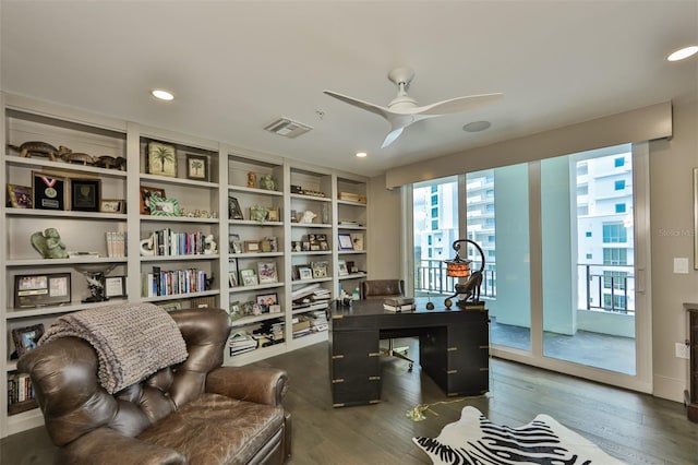 office space featuring ceiling fan and dark hardwood / wood-style flooring