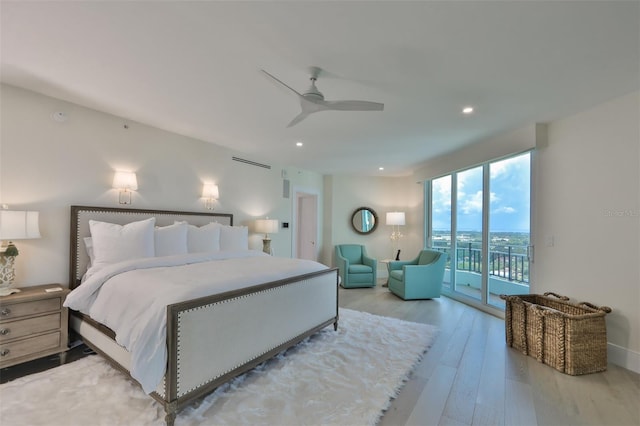 bedroom with access to exterior, ceiling fan, and light hardwood / wood-style flooring