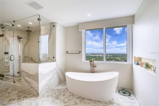 bathroom with shower with separate bathtub