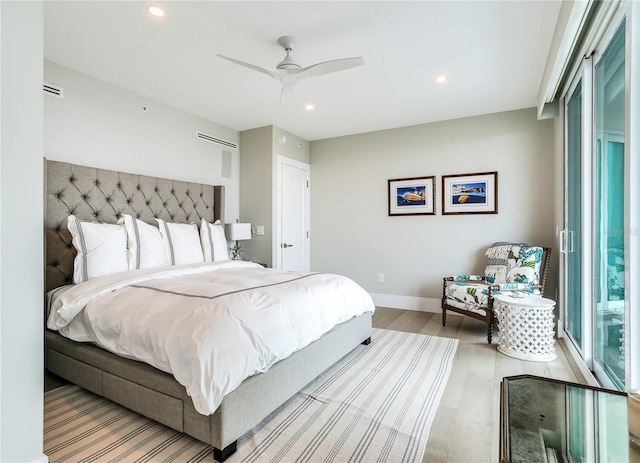 bedroom featuring ceiling fan and light hardwood / wood-style floors