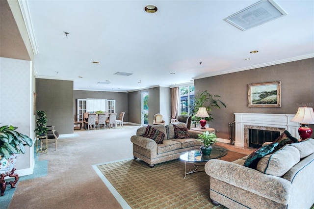 living room featuring crown molding, a fireplace, and carpet