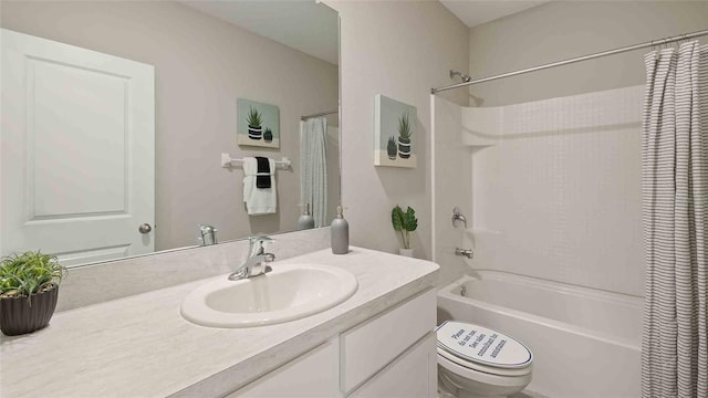 full bathroom with toilet, shower / bath combination with curtain, and vanity
