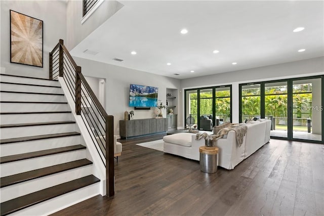 living room featuring dark hardwood / wood-style floors