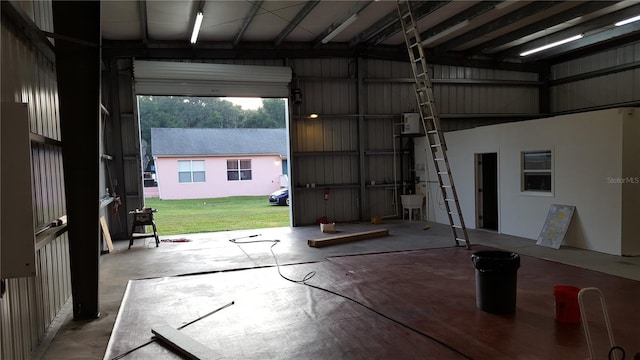 garage with a yard and sink