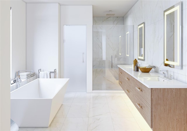 bathroom with tile walls, tile patterned floors, double sink vanity, and plus walk in shower